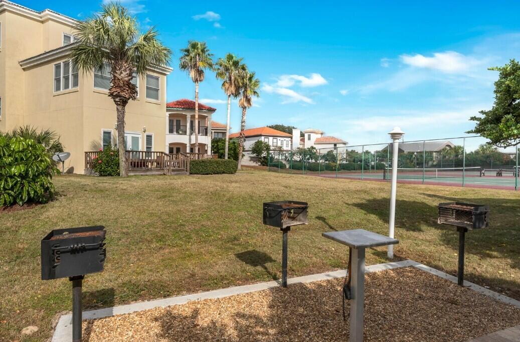 80 Terra Cotta Way Destin, FL 32541 - Photo 49 of 84 a view of a park with swings and slides