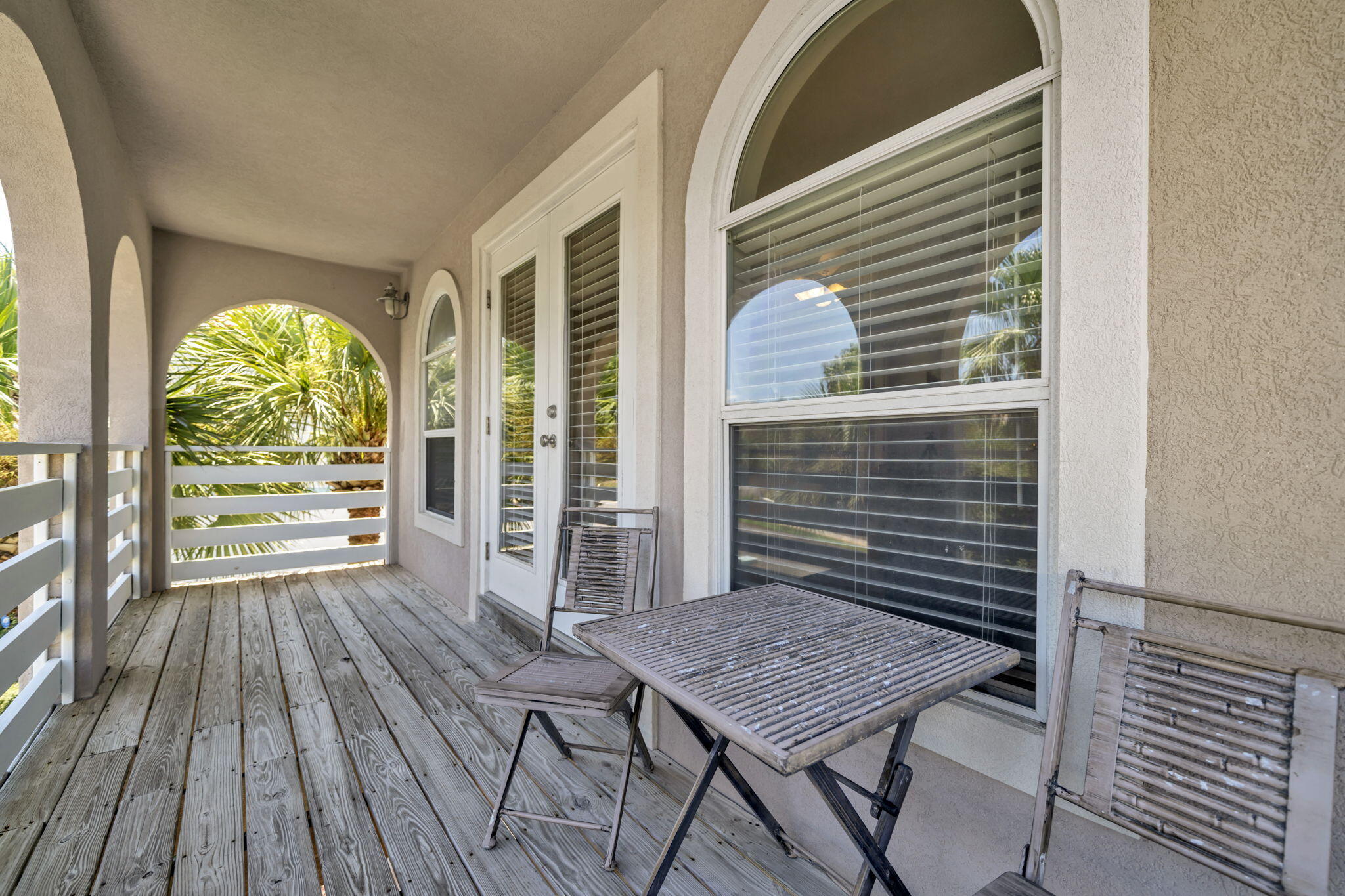 80 Terra Cotta Way Destin, FL 32541 - Photo 75 of 84 a backyard of a house with wooden floor outdoor seating