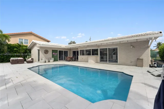 a view of outdoor space yard swimming pool and patio