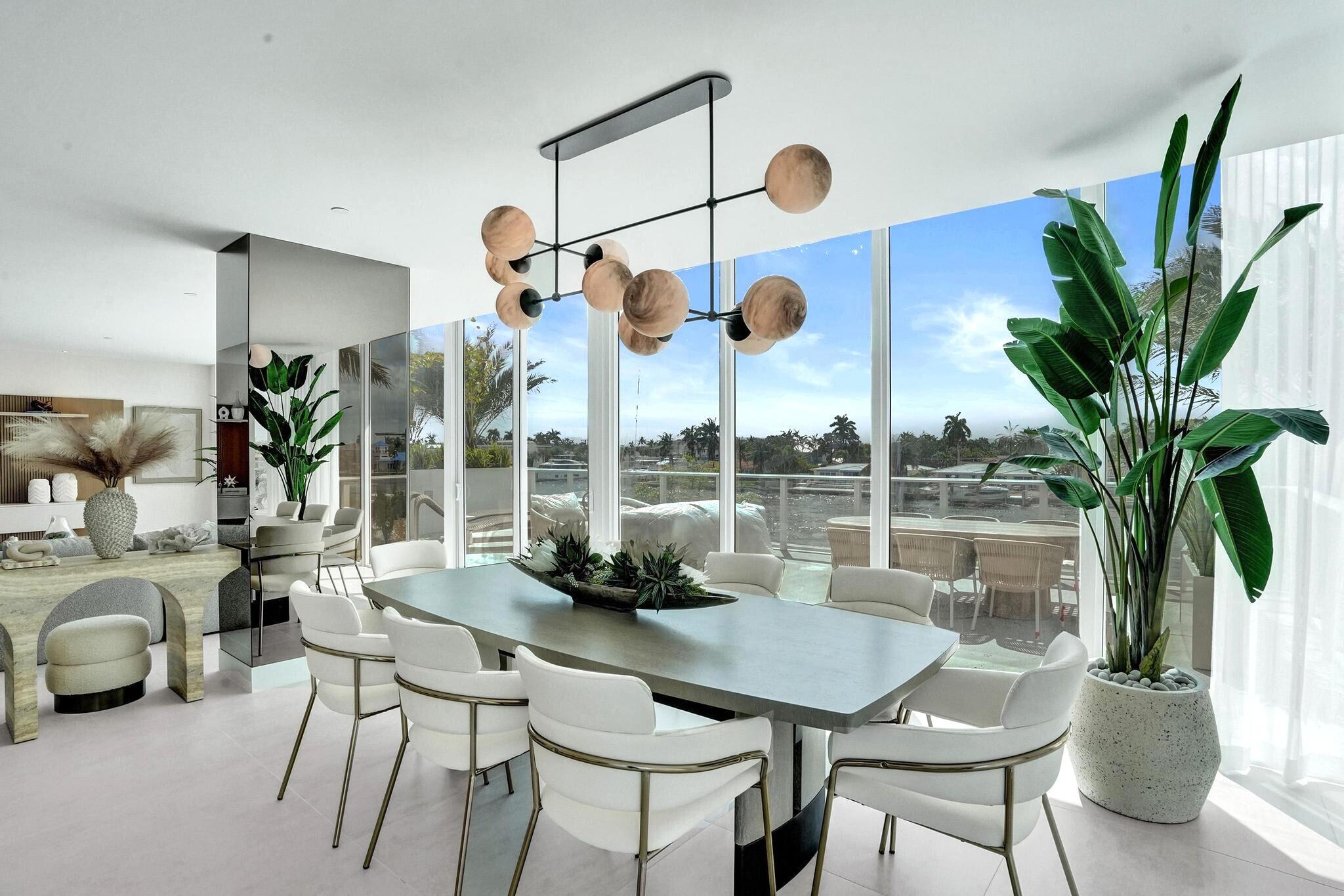 407 North Riverside Drive, Unit 203 Pompano Beach, FL 33062 - Photo 18 of 69 a view of a dining room with furniture window and outside view