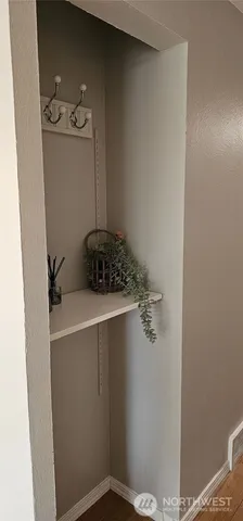 a bathroom with a toilet and shower