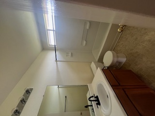 14909 Nuttall Drive Austin, TX 78724 - Photo 9 of 13 Full bath with vanity, shower / tub combination, and light floors
