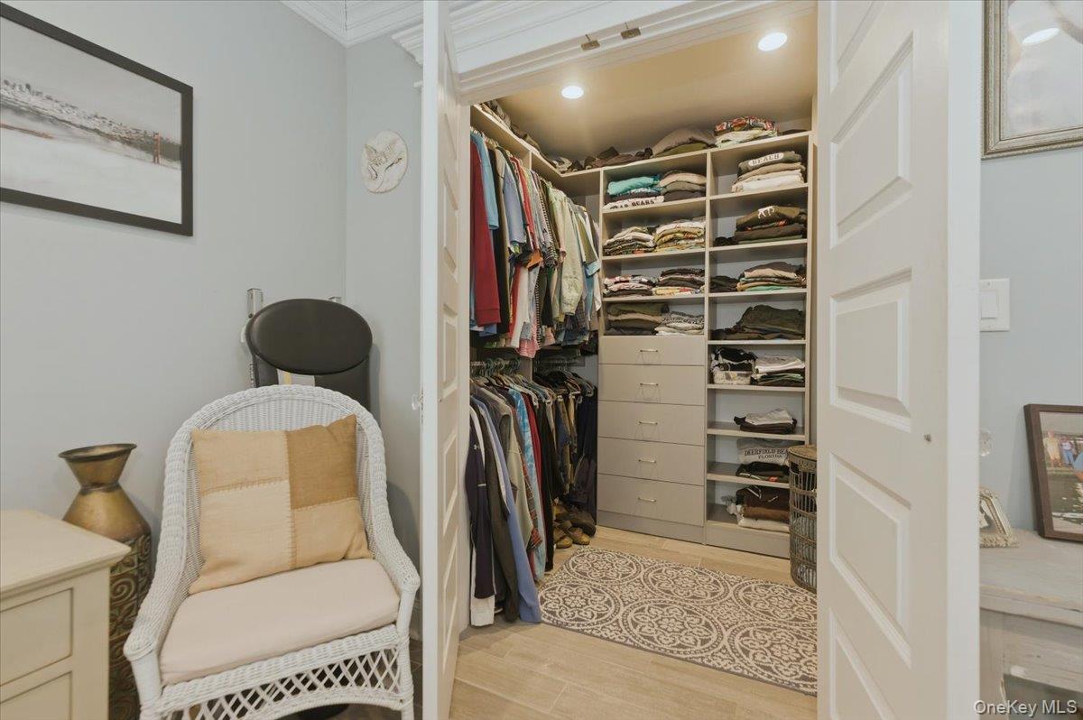 711 Shore Road, Unit 1J Long Beach, NY 11561 - Photo 13 of 22 a bathroom with a toilet and a shower