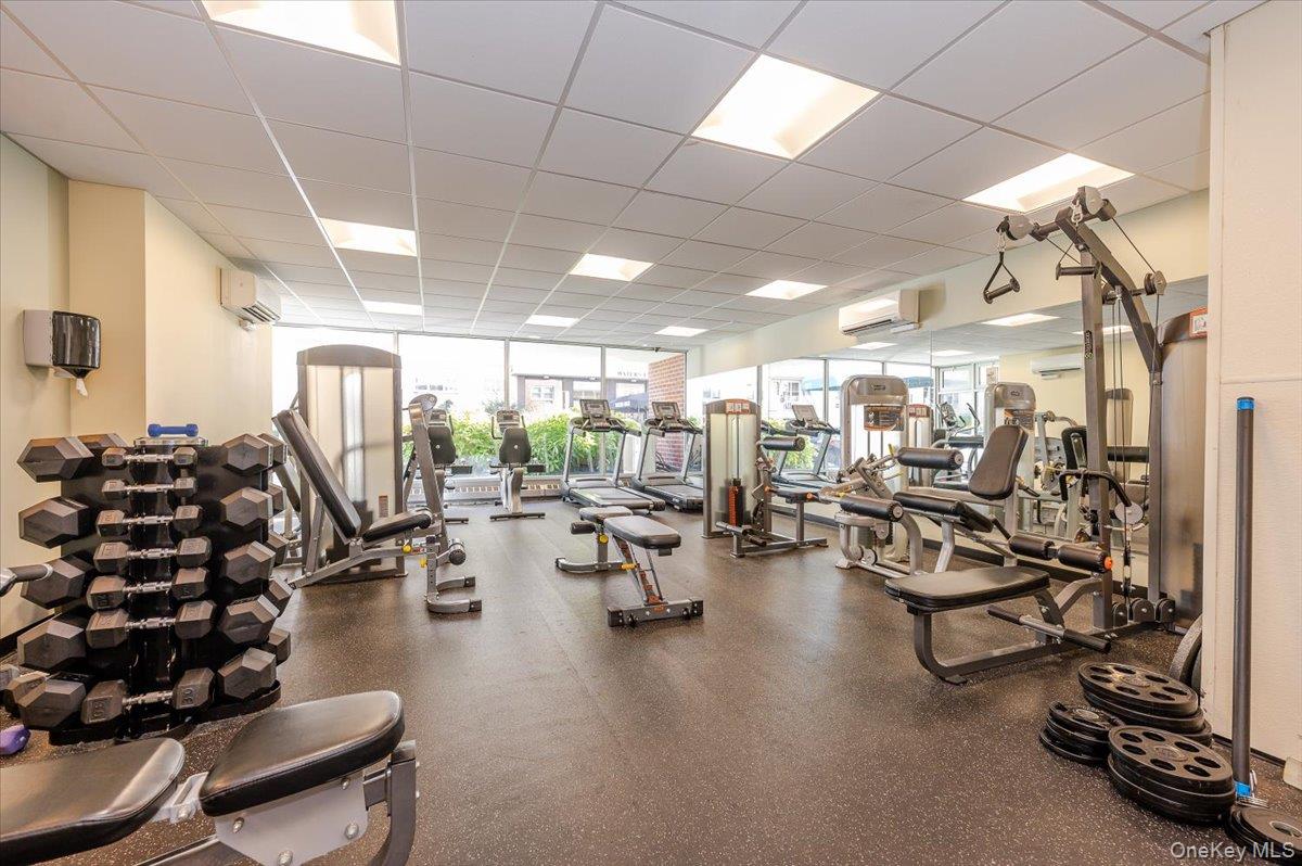 711 Shore Road, Unit 1J Long Beach, NY 11561 - Photo 19 of 22 a view of a room with gym equipment