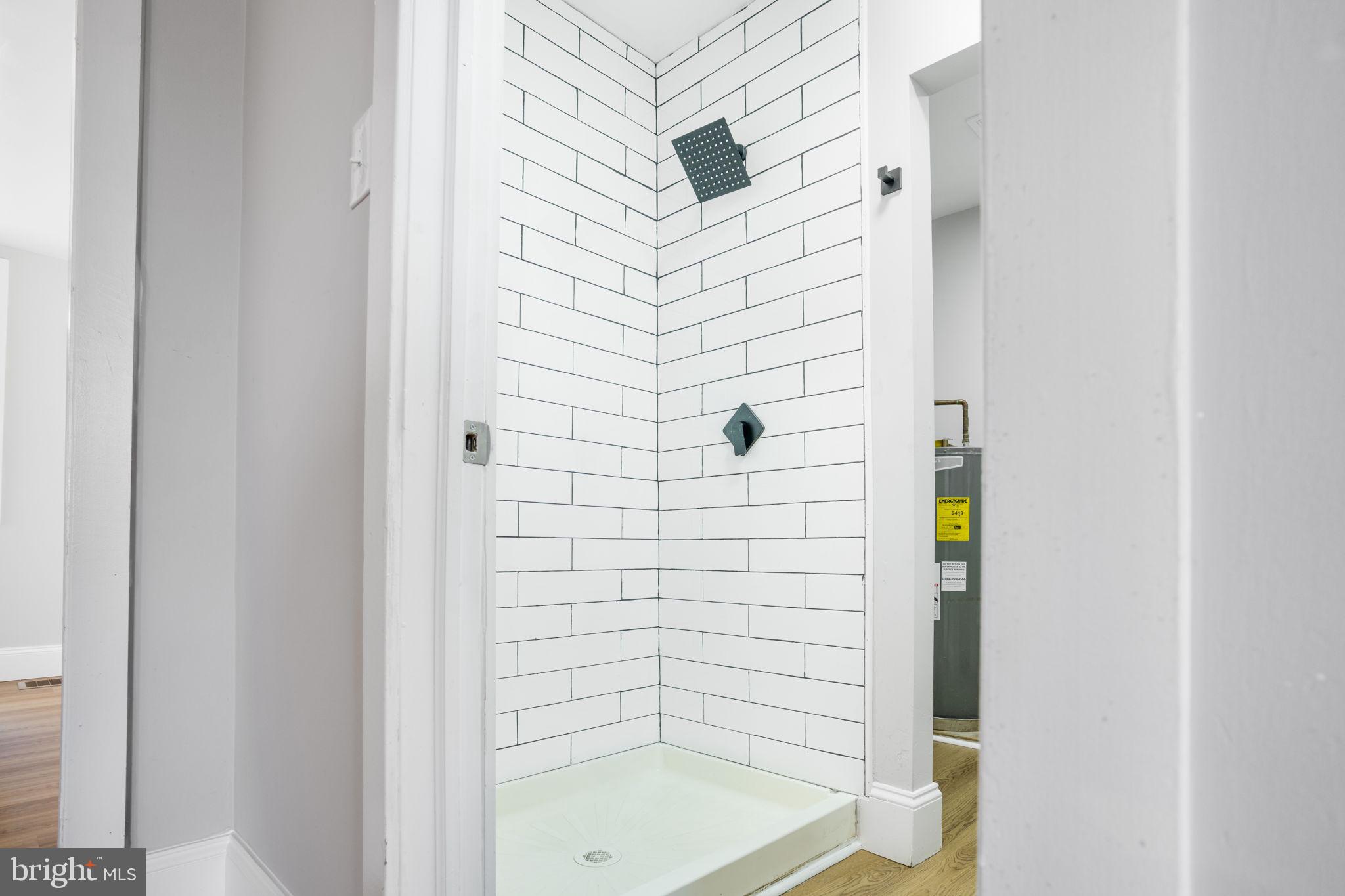 246 Chestnut Street Mount Holly, NJ 08060 - Photo 18 of 25 a bathroom with a shower