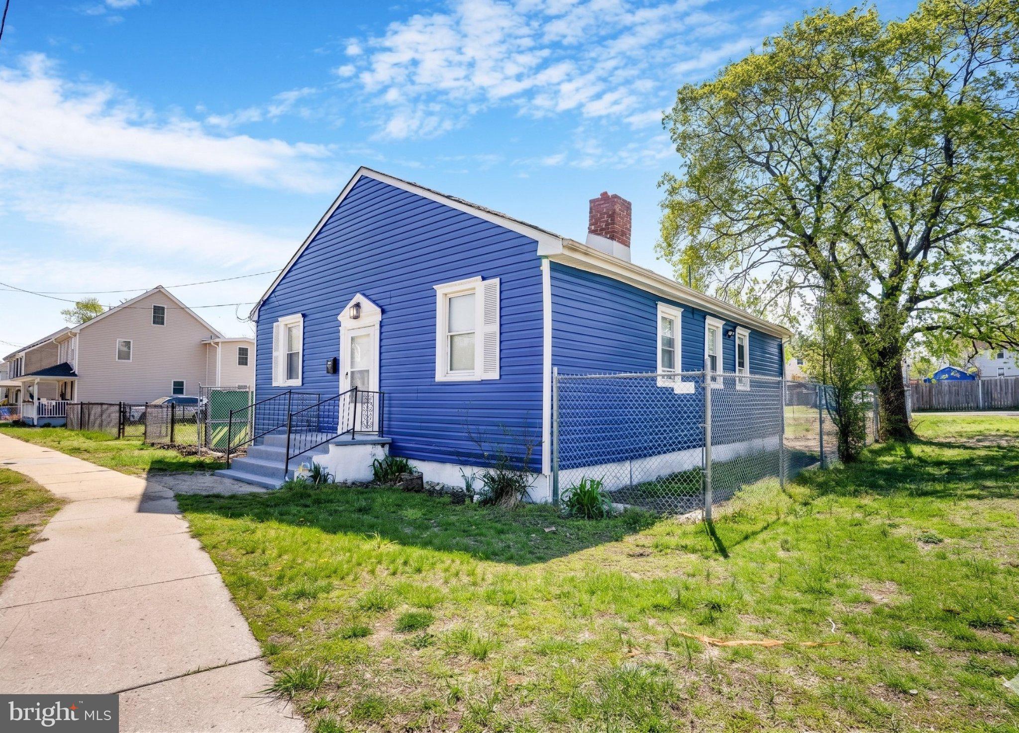 246 Chestnut Street Mount Holly, NJ 08060 - Photo 4 of 25 a view of a house with a yard