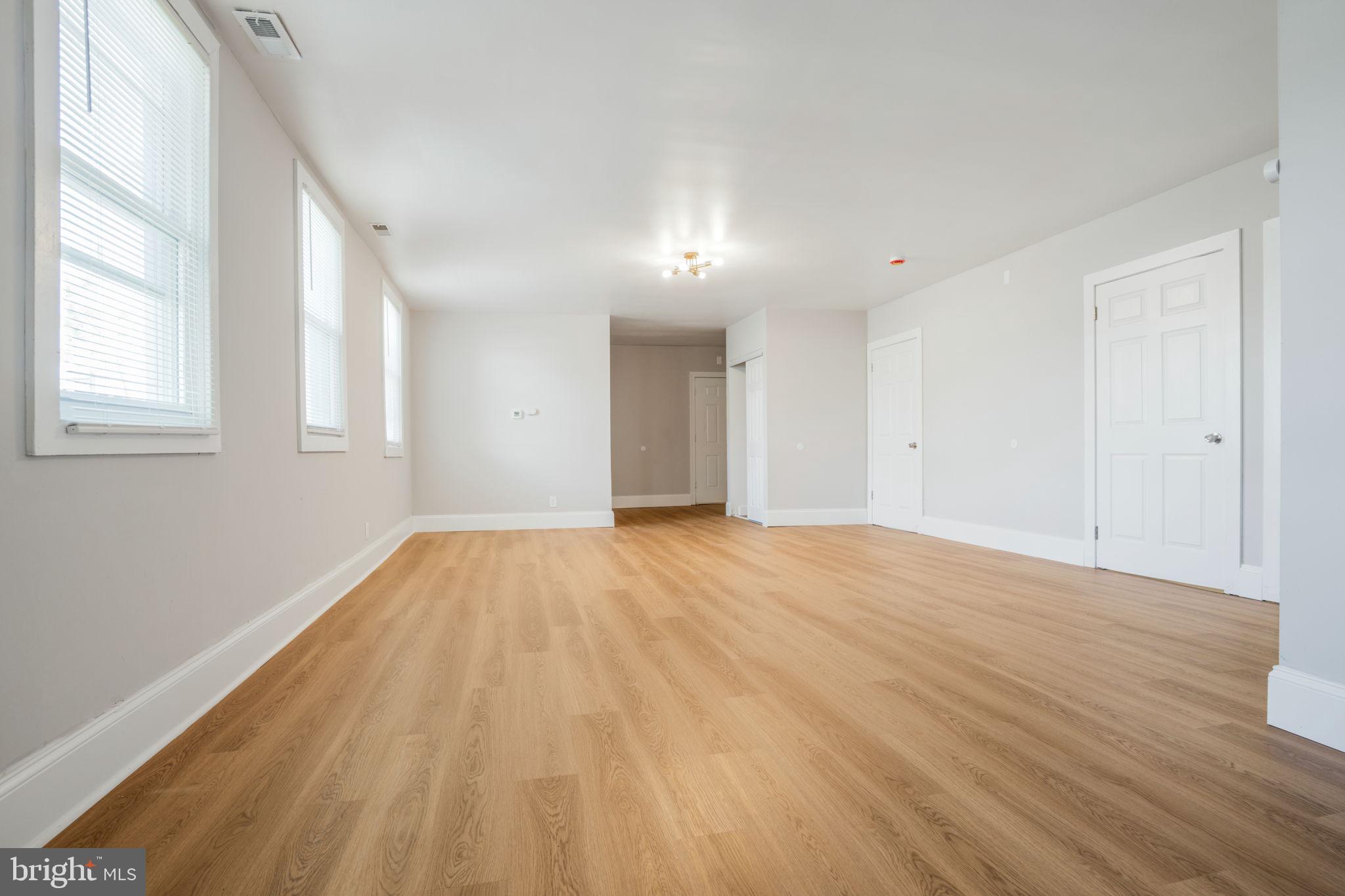 246 Chestnut Street Mount Holly, NJ 08060 - Photo 10 of 25 a view of empty room with wooden floor