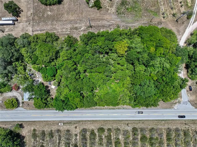 a view of a yard with an outdoor space