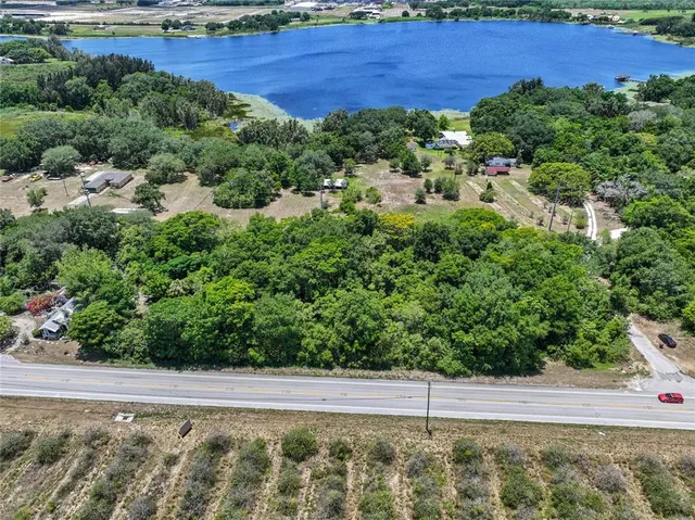 a view of a yard with an outdoor space