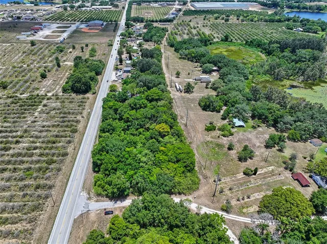an aerial view of residential house with outdoor space