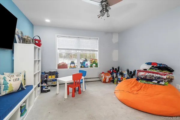 a room with furniture and a window