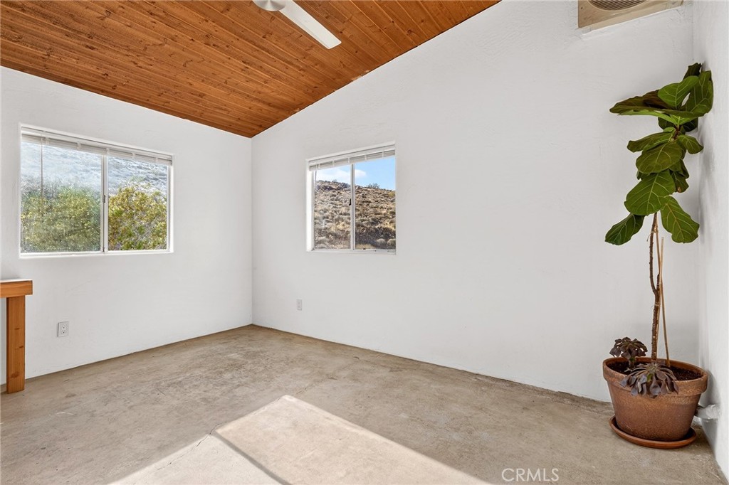 60473 Starlight Road Joshua Tree, CA 92252 - Photo 22 of 39 a room with a chandelier