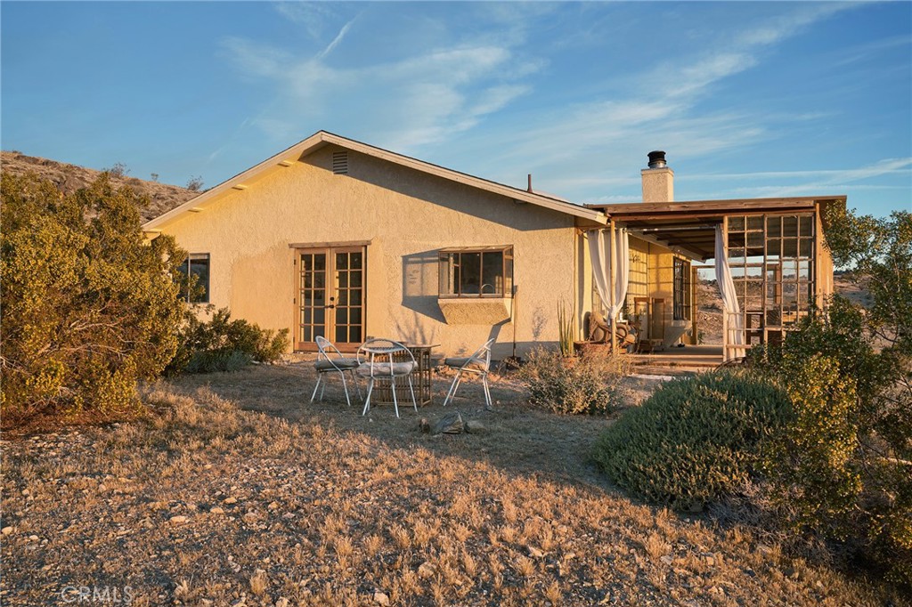 60473 Starlight Road Joshua Tree, CA 92252 - Photo 32 of 39 a view of a house with patio