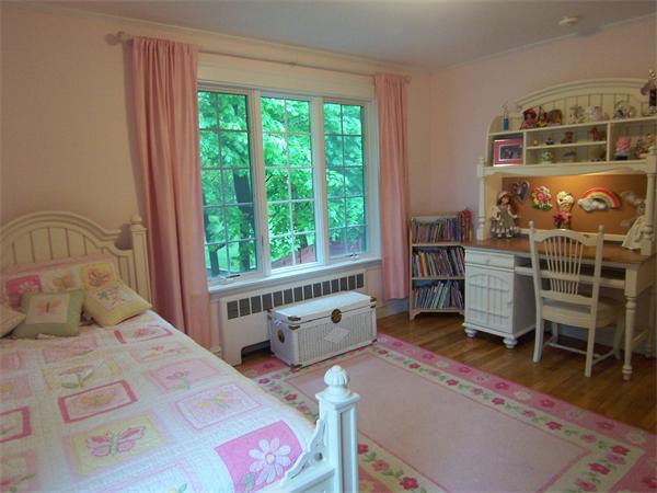 36 Dolphin Road Newton, MA 02459 - Photo 12 of 17 a bedroom with a bed and large windows