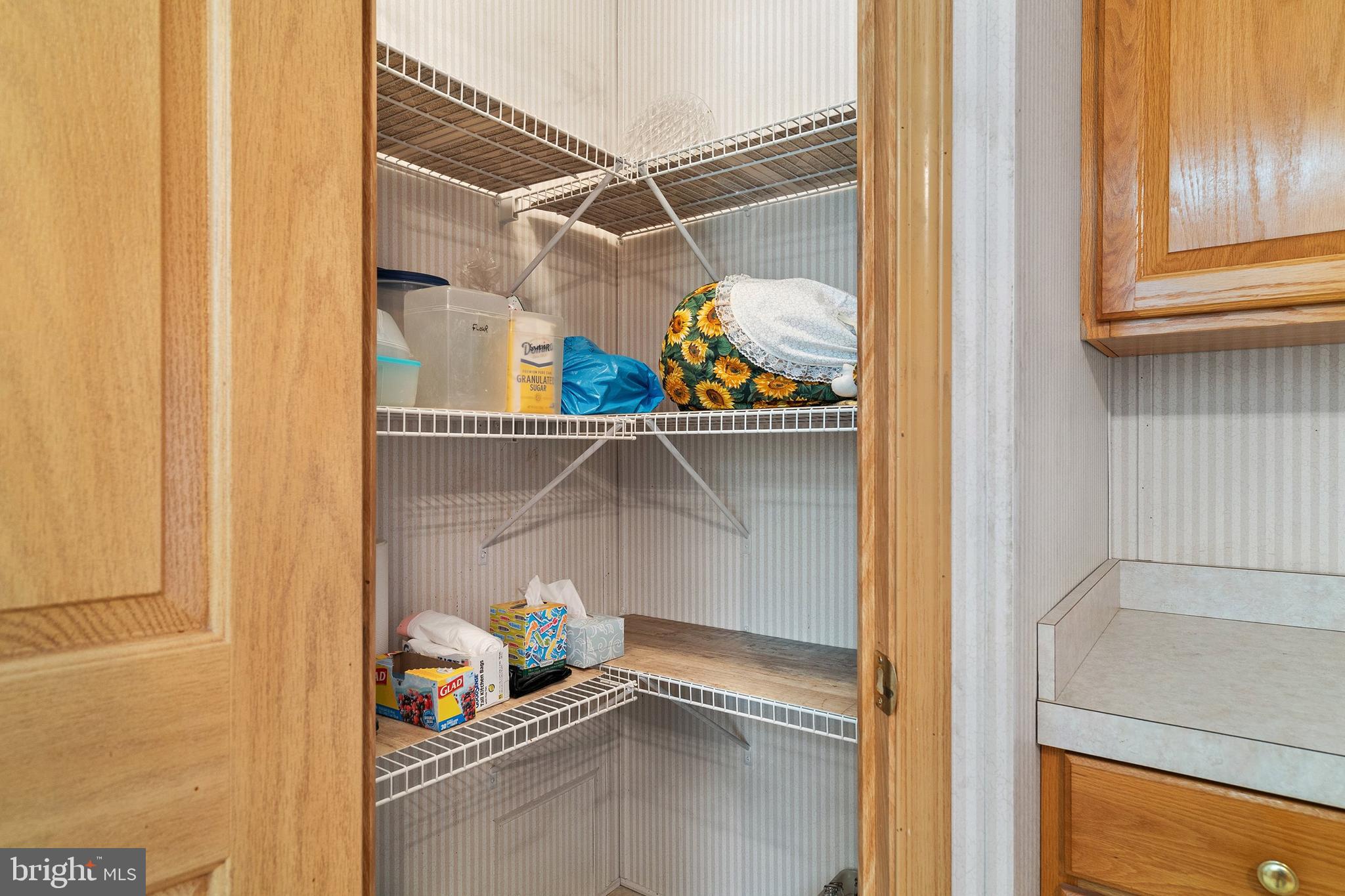 1104 Sycamore Court Whiting, NJ 08759 - Photo 18 of 54 a kitchen with lots of clutter and stainless steel appliances