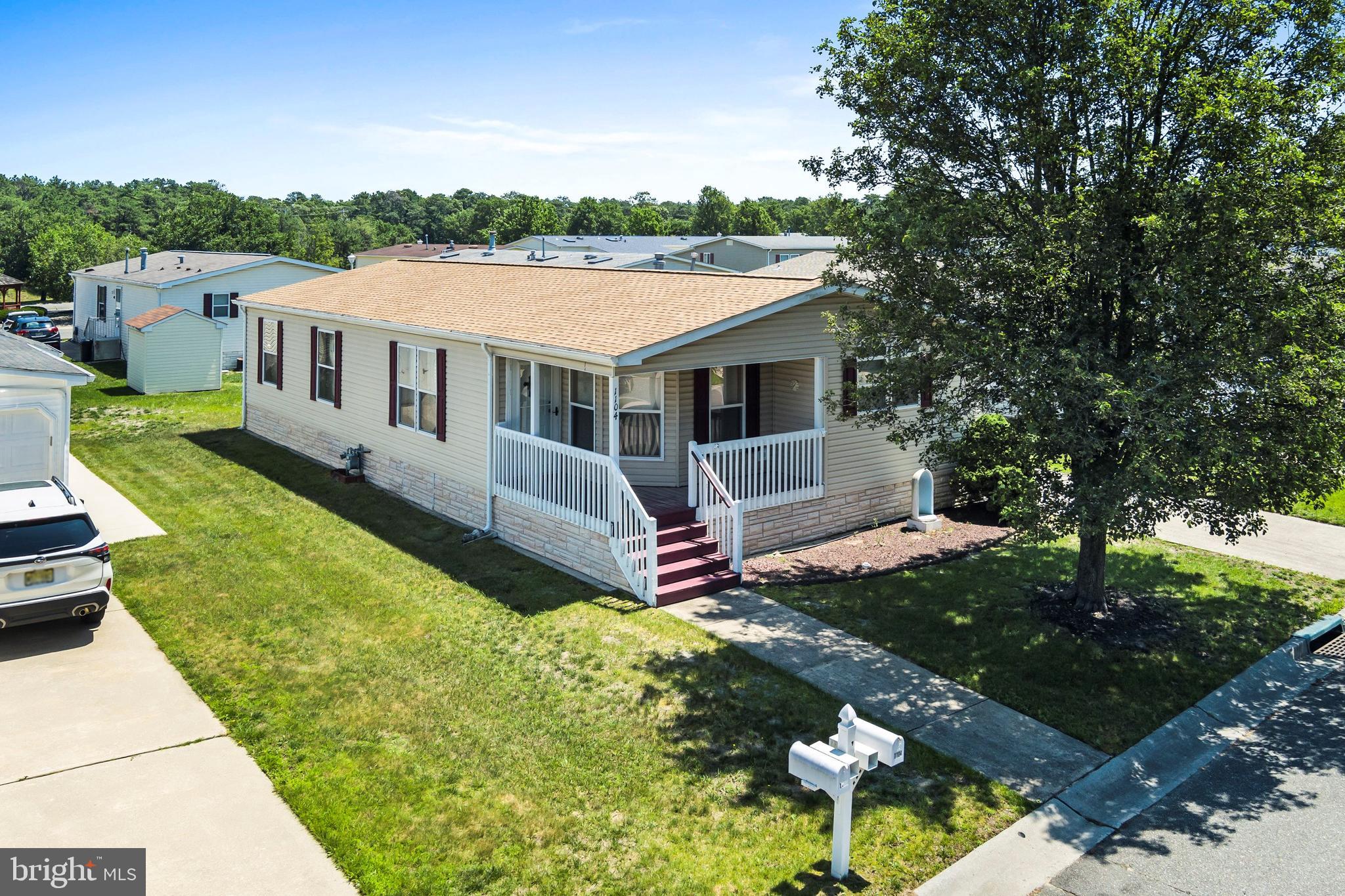 1104 Sycamore Court Whiting, NJ 08759 - Photo 2 of 54 a aerial view of a house with a yard