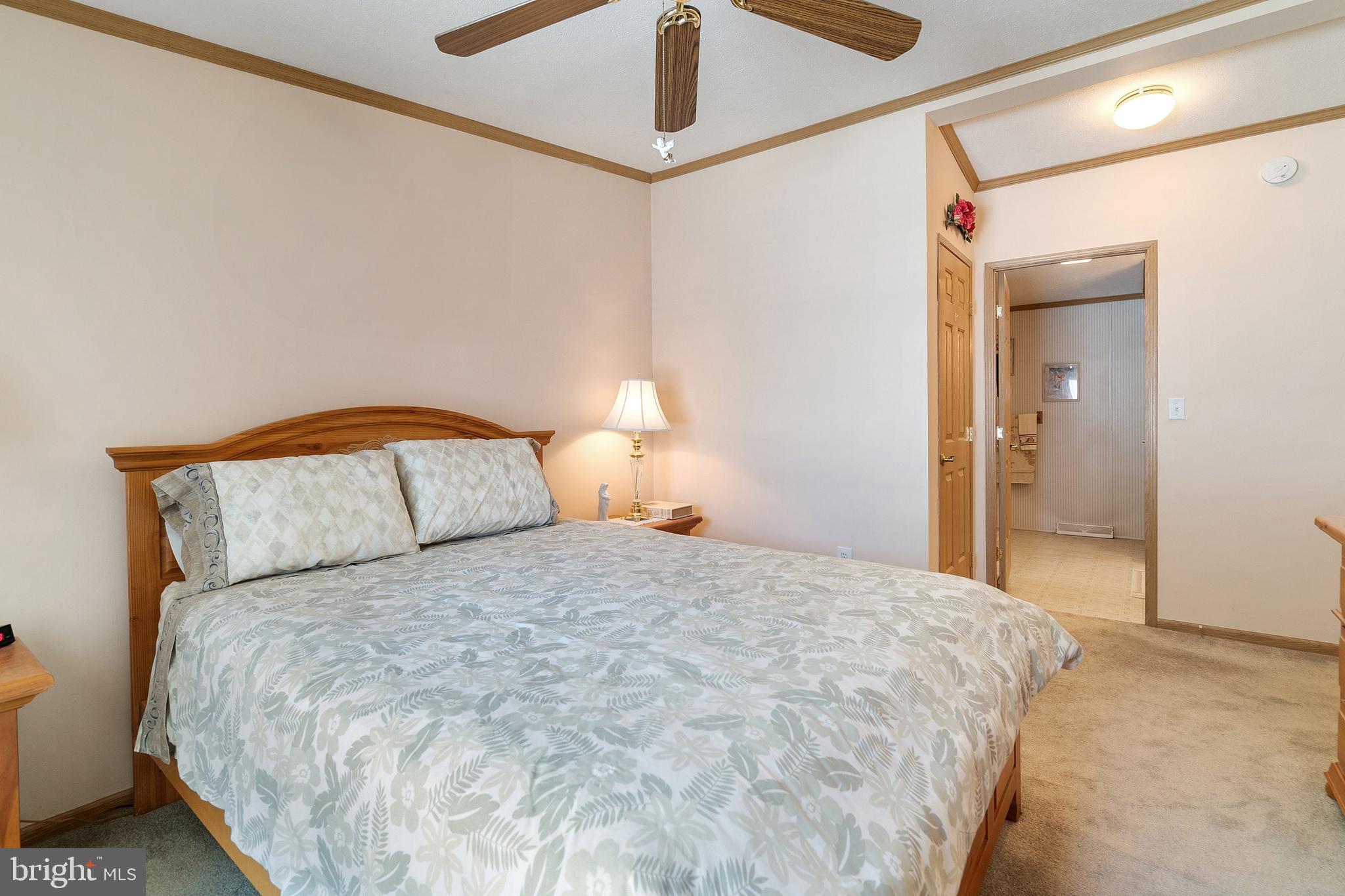 1104 Sycamore Court Whiting, NJ 08759 - Photo 21 of 54 a large bed in a white room