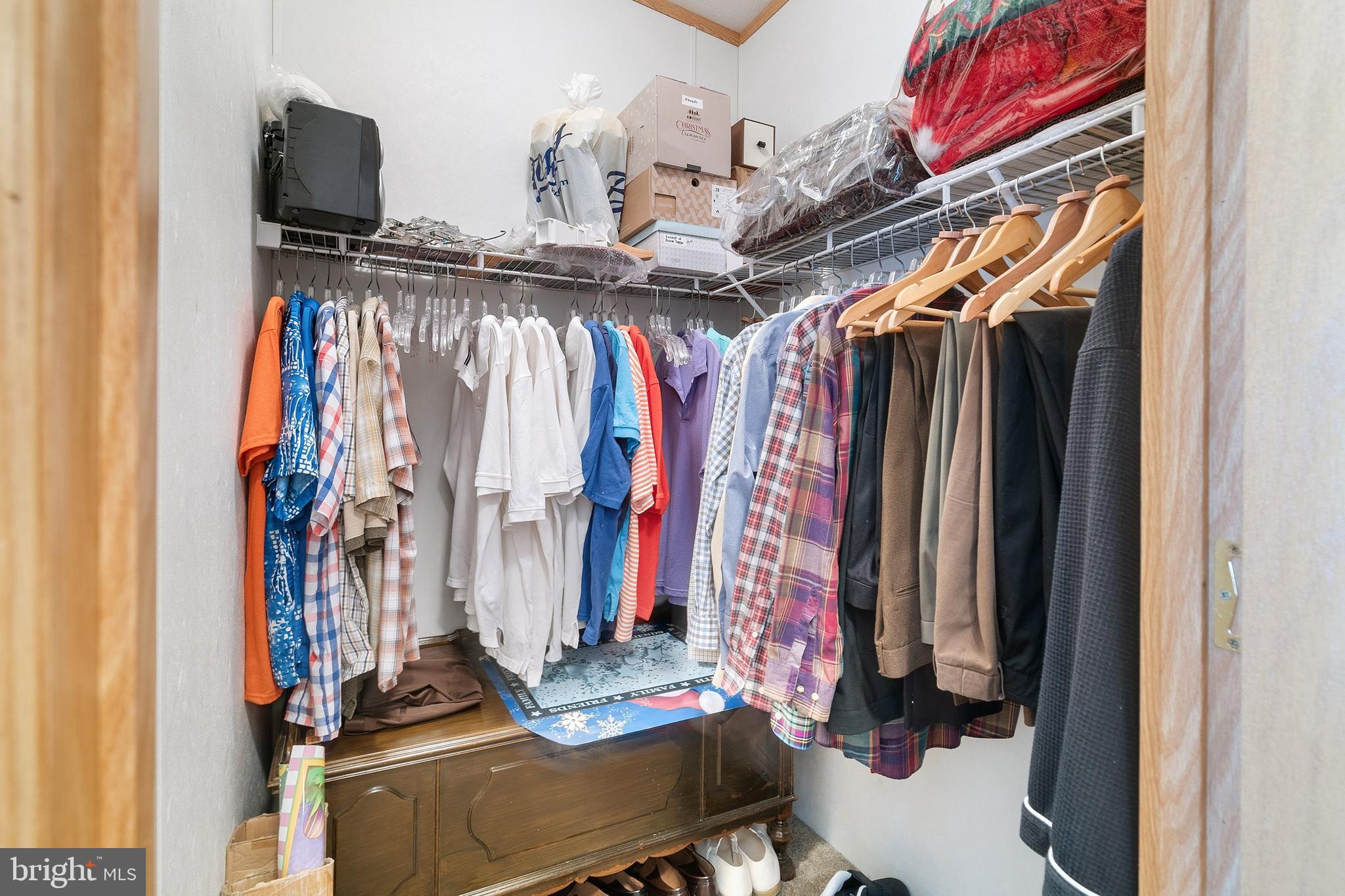 1104 Sycamore Court Whiting, NJ 08759 - Photo 22 of 54 a view of walk in closet with clothes