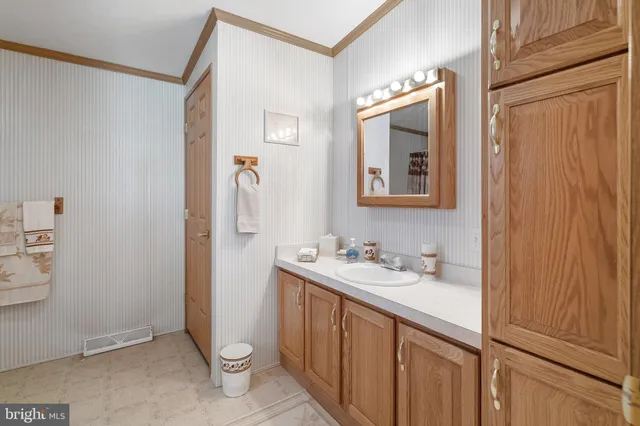a bathroom with a shower and a toilet