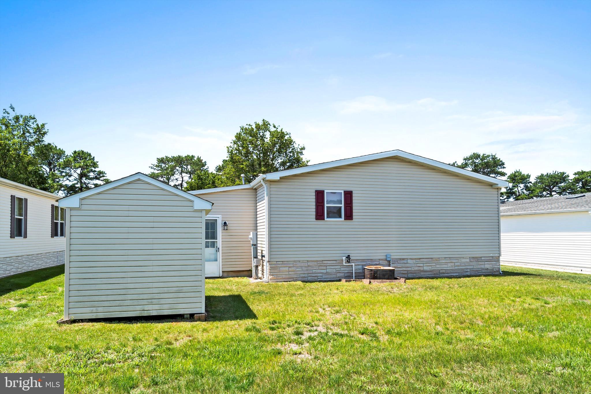 1104 Sycamore Court Whiting, NJ 08759 - Photo 29 of 54 a view of a backyard