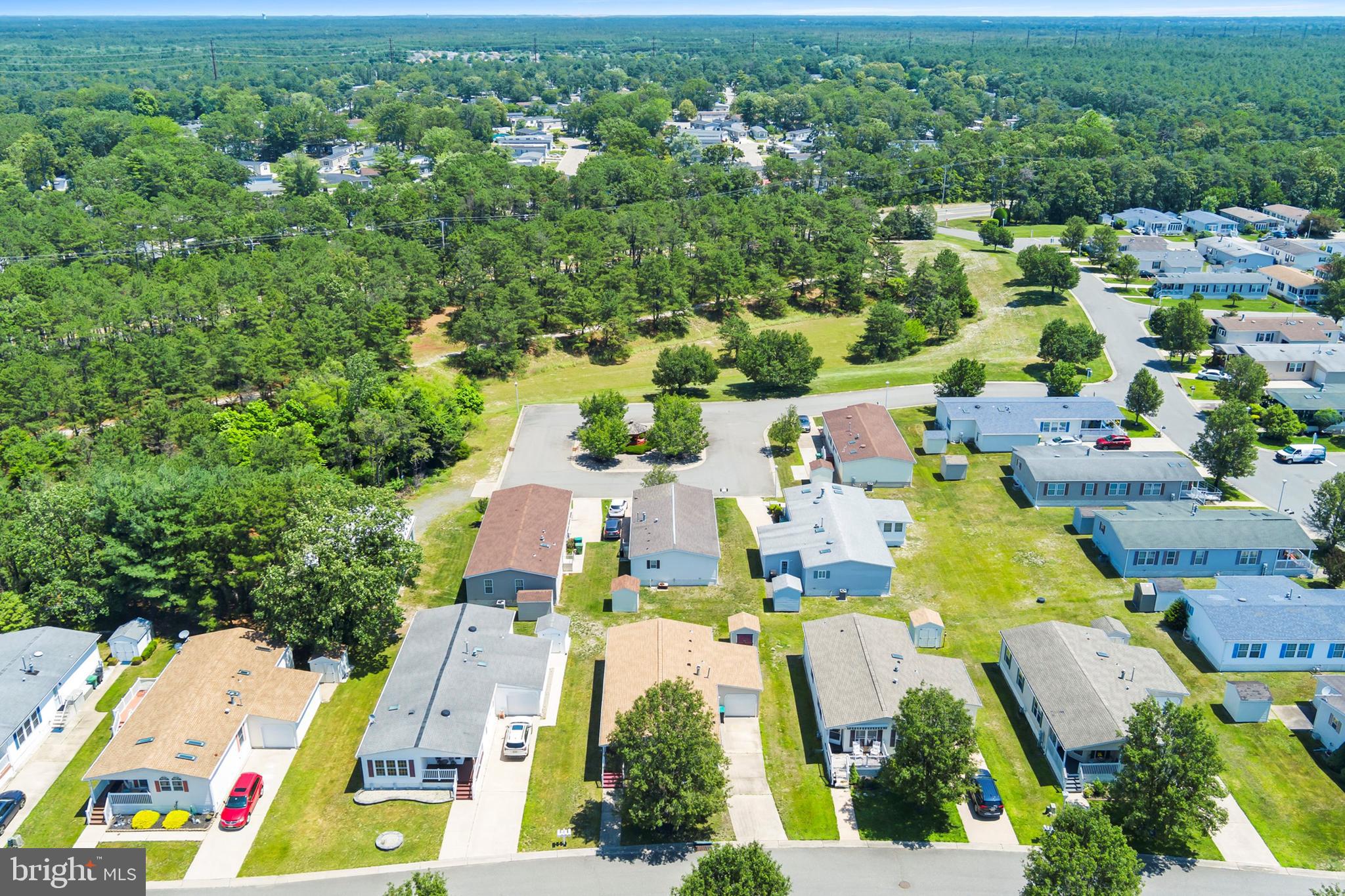 1104 Sycamore Court Whiting, NJ 08759 - Photo 4 of 54 an aerial view of residential houses with outdoor space