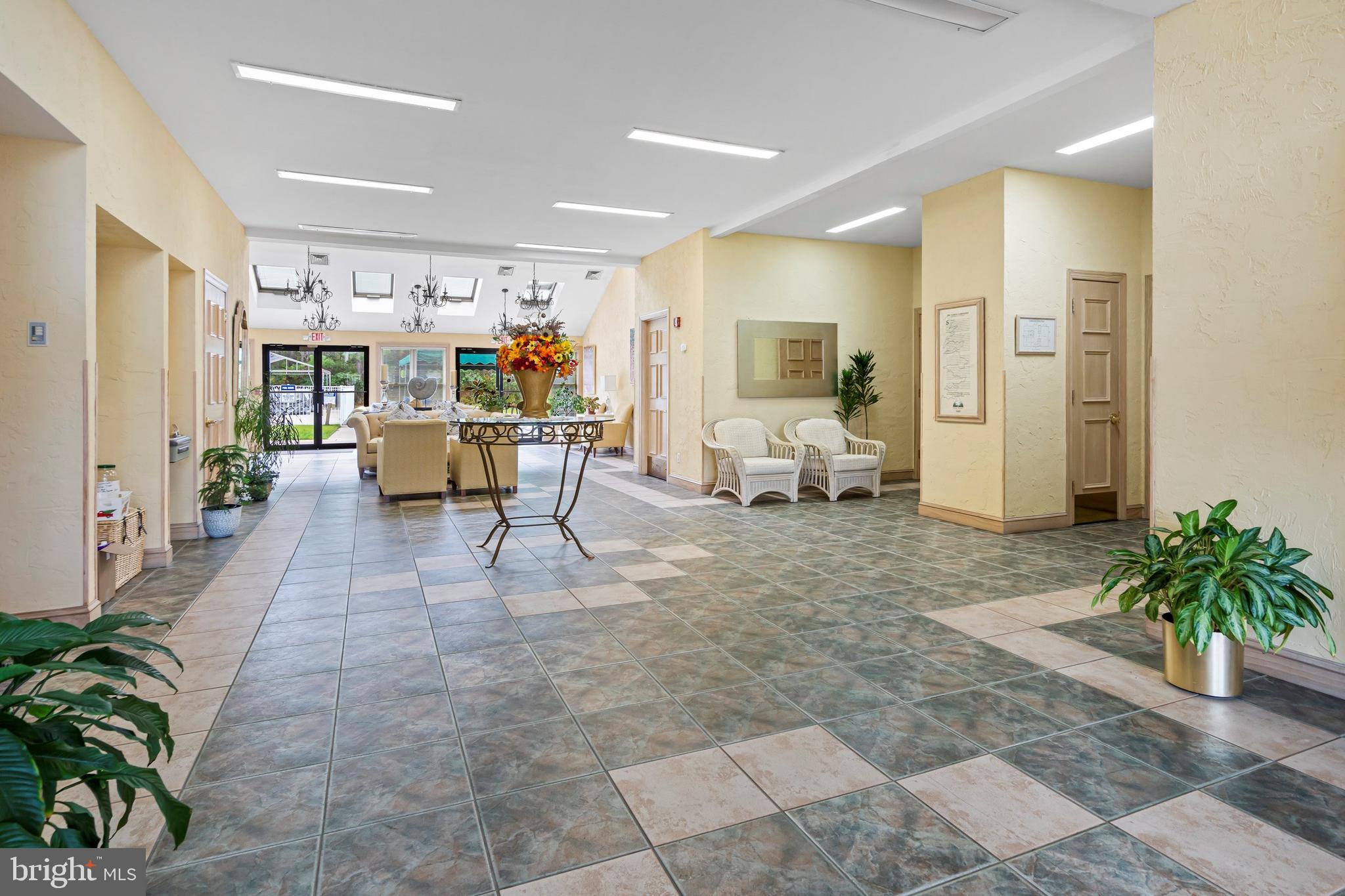 1104 Sycamore Court Whiting, NJ 08759 - Photo 43 of 54 a living room with furniture and a potted plant