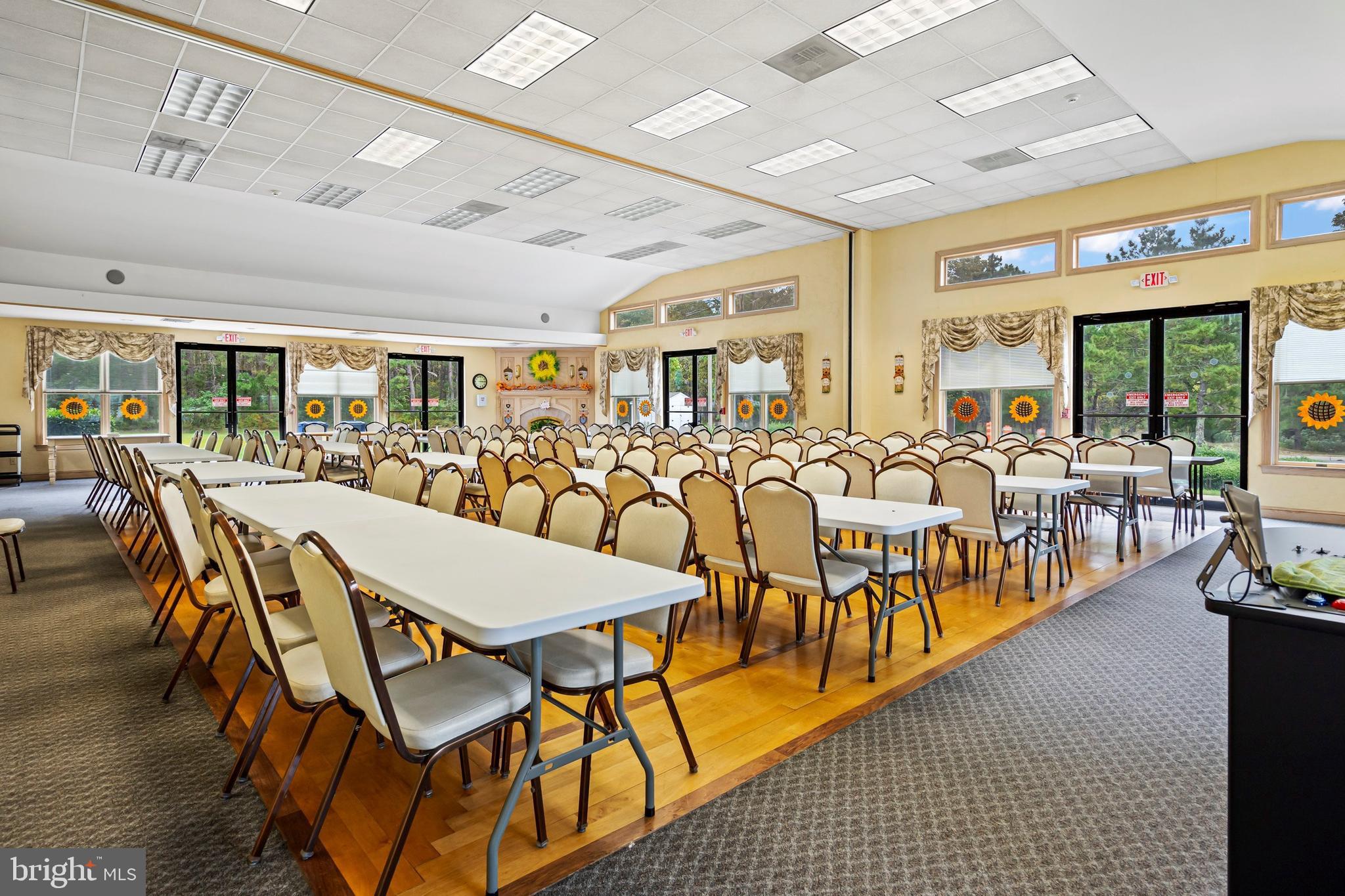 1104 Sycamore Court Whiting, NJ 08759 - Photo 44 of 54 a dining hall with lots of chairs and wooden floor
