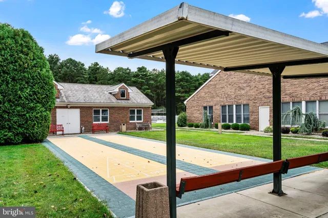a view of swimming pool with a yard