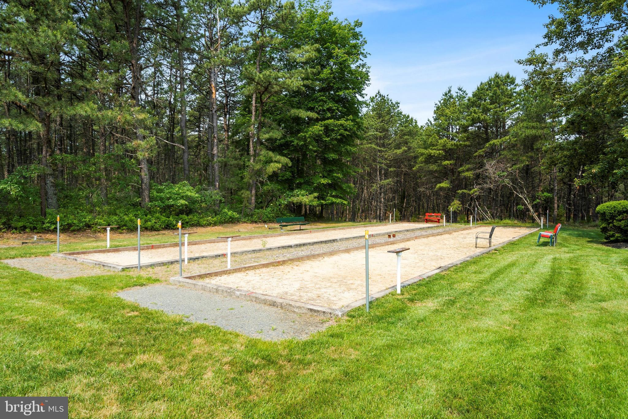 1104 Sycamore Court Whiting, NJ 08759 - Photo 53 of 54 a view of a swimming pool with a yard