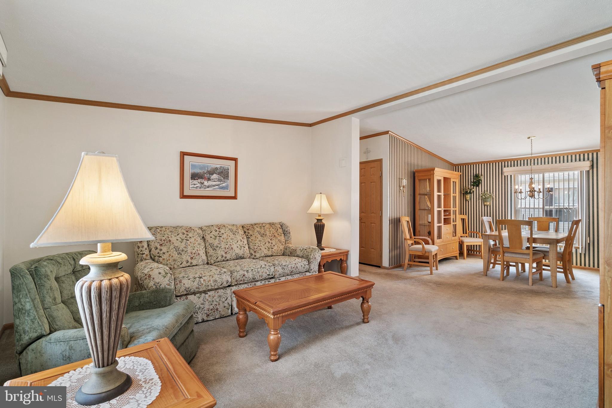 1104 Sycamore Court Whiting, NJ 08759 - Photo 9 of 54 a living room with furniture and a table