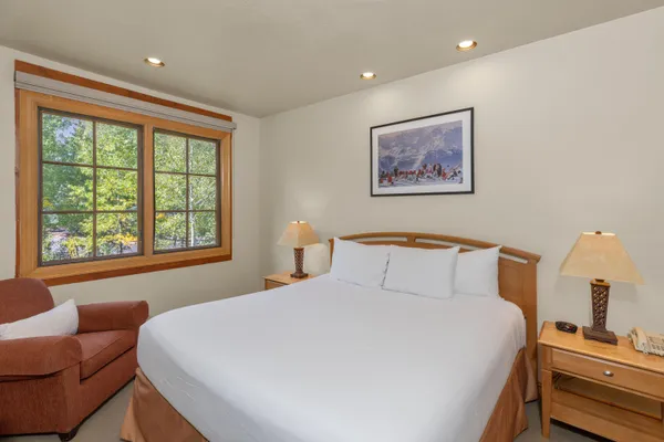 a bath tub sitting next to a window