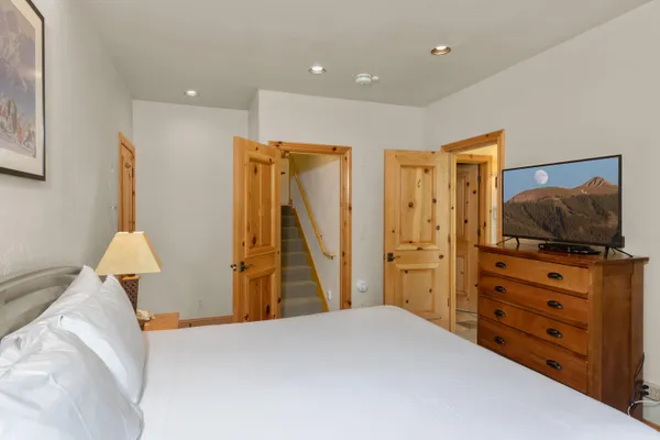 an aerial view of a house with swimming pool and sitting area