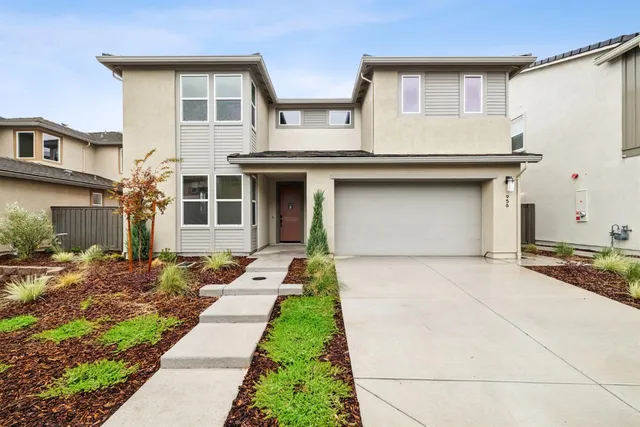 a front view of house with yard