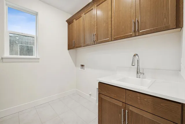 a close view of a sink and a microwave