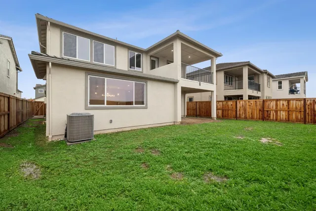 a house view with a garden space