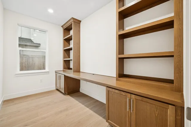 a view of walk in closet with window