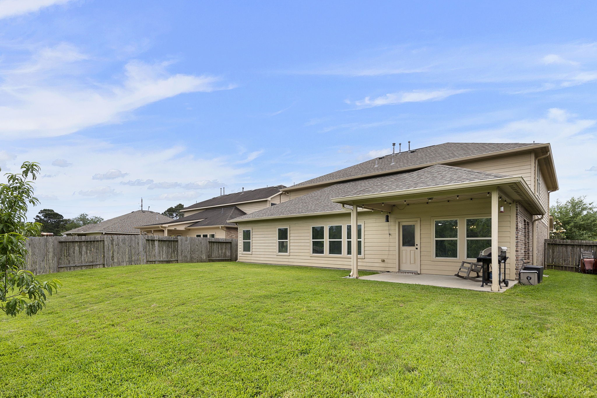 22810 Dale River Road Tomball, TX 77375 - Photo 33 of 44 This large backyard offers plenty of space for a trampoline or playset and still enough room to run around!