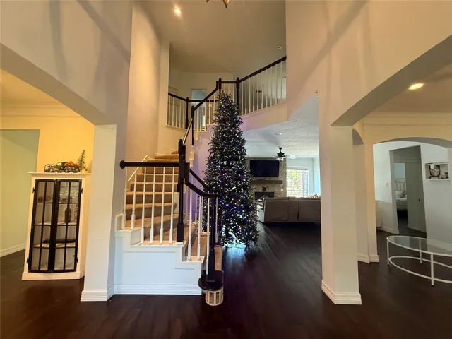 a view of entryway with wooden floor