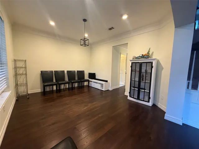 a view of livingroom with furniture and wooden floor