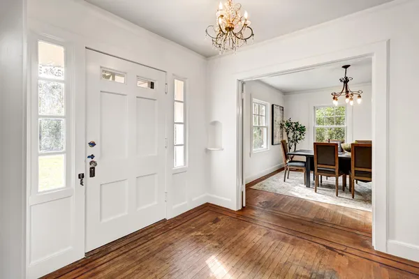 a view of a dining room with furniture window and outside view