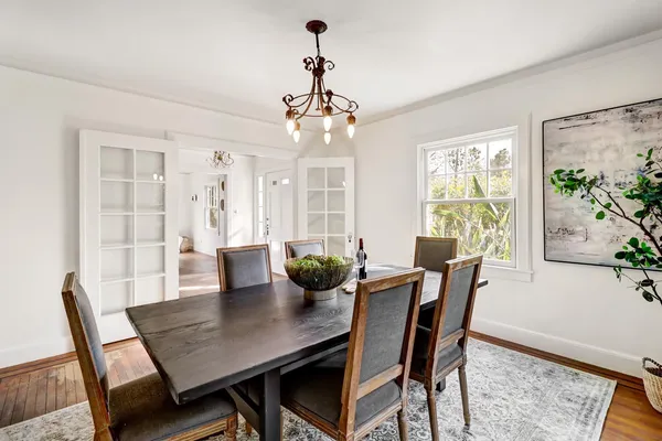 a view of a bathroom with a sink and a mirror