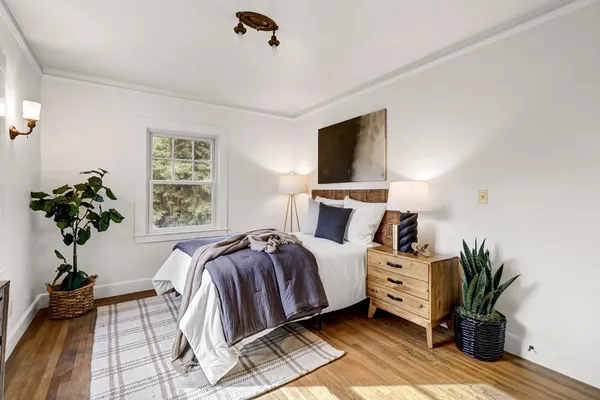 a bathroom with a bathtub and window