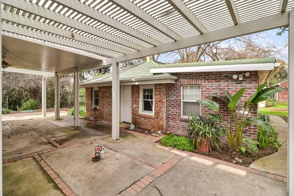 a view of a house with a garden