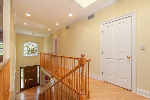 330 Greenleaf Avenue Wilmette, IL 60091 - Photo 14 of 23 a view of entryway with stairs and wooden floor