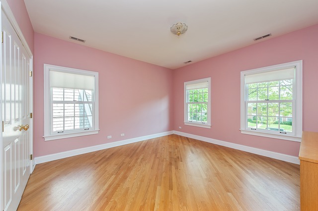 330 Greenleaf Avenue Wilmette, IL 60091 - Photo 16 of 23 a view of an empty room with wooden floor and a window