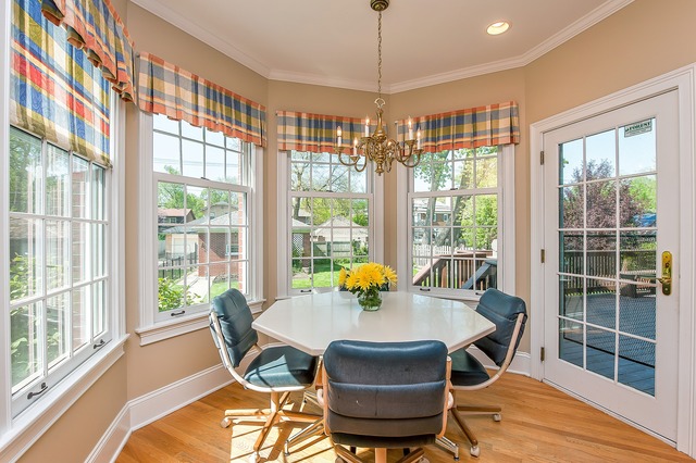 330 Greenleaf Avenue Wilmette, IL 60091 - Photo 8 of 23 a view of a dining room with furniture window and outside view