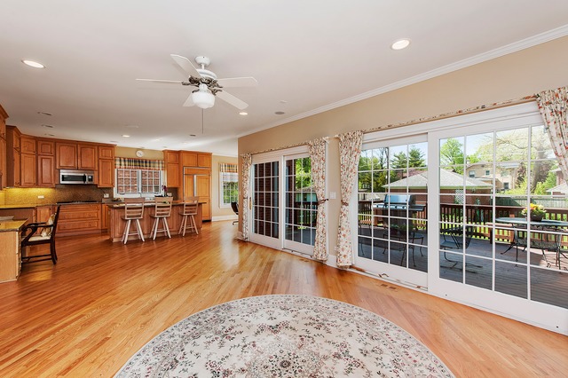 330 Greenleaf Avenue Wilmette, IL 60091 - Photo 9 of 23 a view of a kitchen with furniture and wooden floor