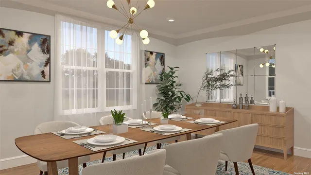 a view of a dining room with furniture and window