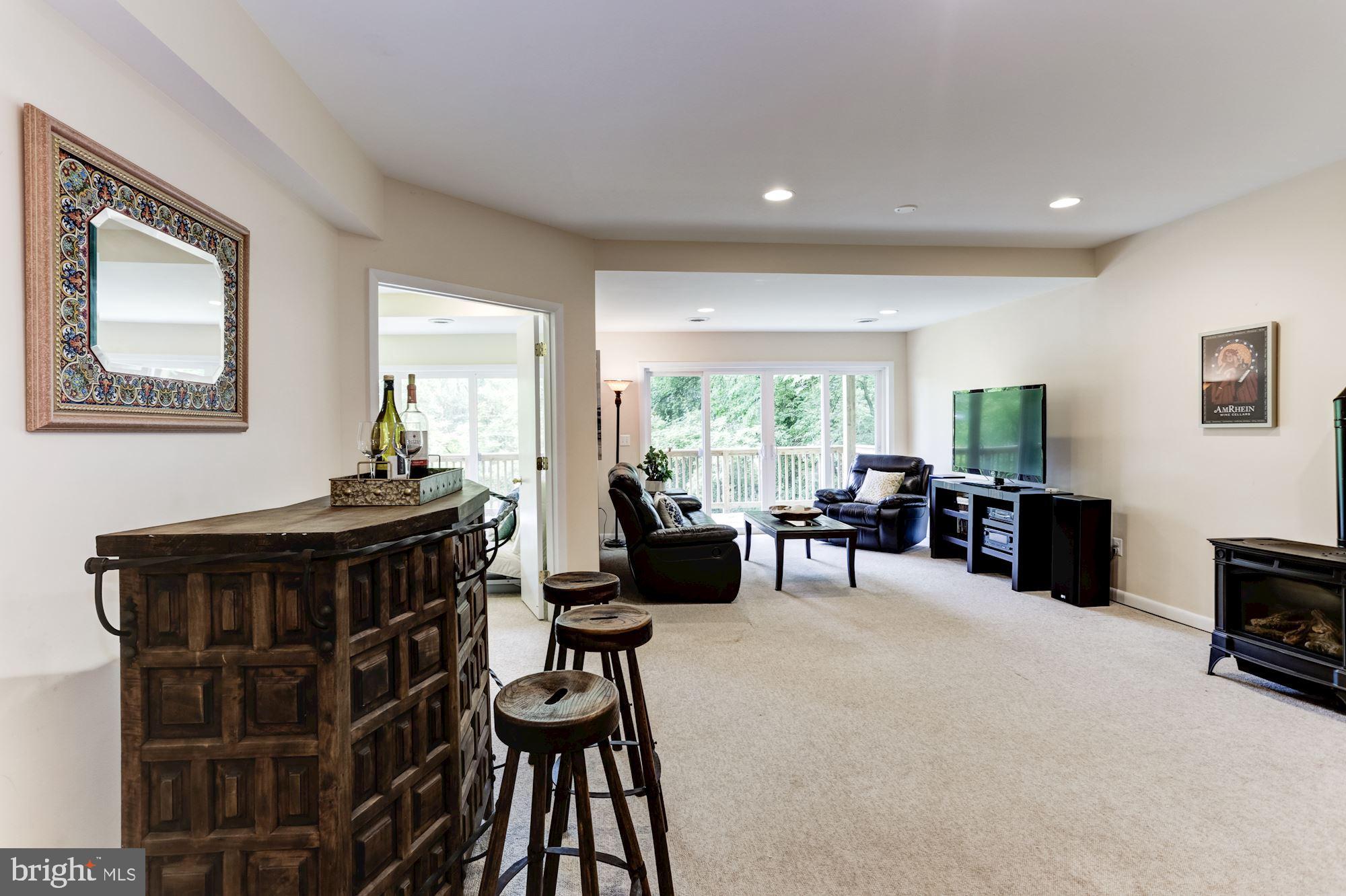 423 Mountain Road Crownsville, MD 21032 - Photo 37 of 69 Lower Level Family Room opens to a third deck