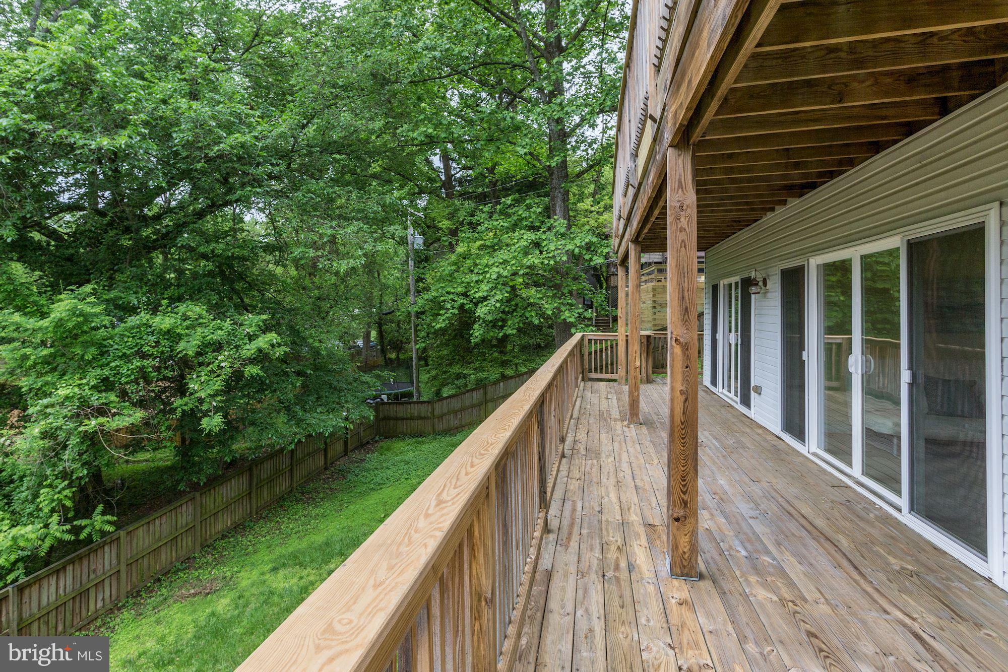 423 Mountain Road Crownsville, MD 21032 - Photo 46 of 69 This deck runs across the back of the entire house